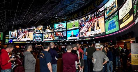 Gambling addiction hotlines say volume is up and callers are younger a.